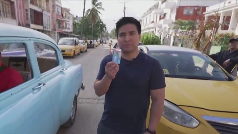 Taxi drivers wait in long fuel lines as Cuba’s economic crisis worsens