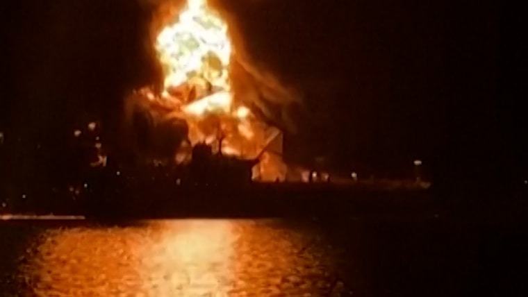 Two fuel tankers caught fire after strikes in Iraqi waters