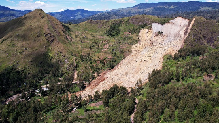 Papua New Guinea moved to evacuate an estimated 7,900 people from remote villages near the site of a deadly landslide on May 28, as authorities warned of further slips.