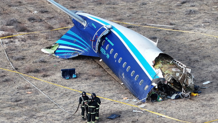 A drone view shows the crash site of a passenger plane