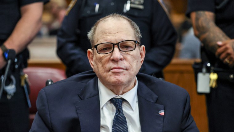 Harvey Weinstein seated in court