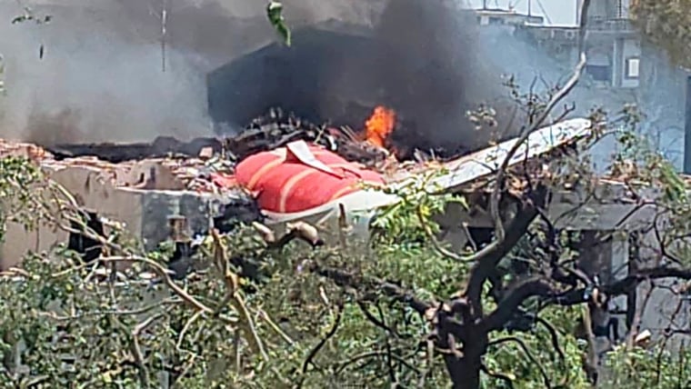 Smartphone image taken by local residents captures the moment an Air India plane with at least 242 people on board that was