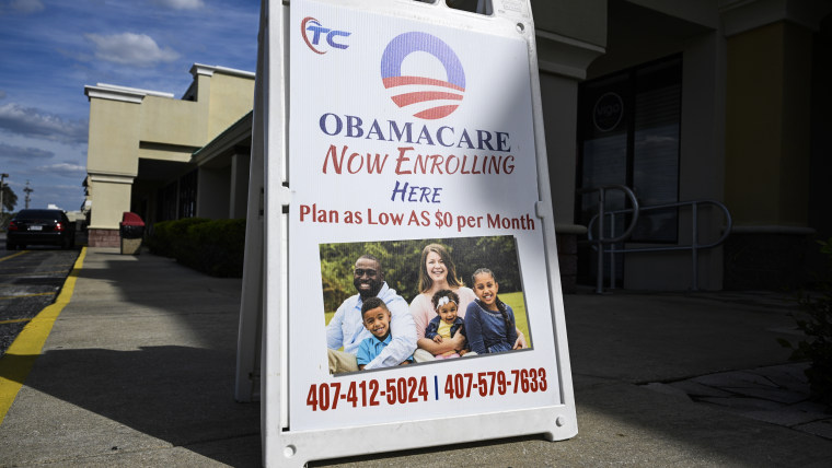 A sign advertising Obamacare health insurance enrollment