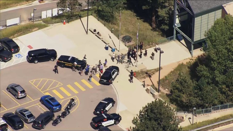 Police respond at Evergreen High School in Colorado.