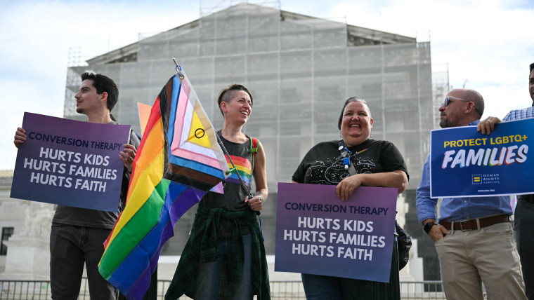Demonstrators protest against conversion therapy outside the Supreme Court 