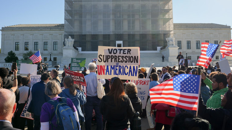 Demonstrators outside the Supreme Court on Wednesday, Oct. 15, 2025. 