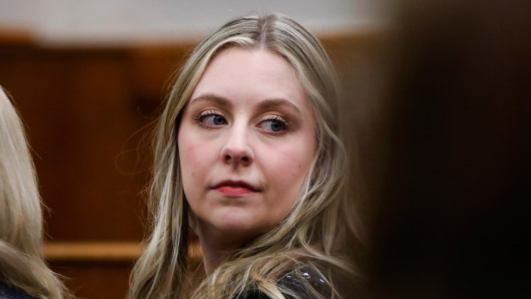 Abby Zwerner looks back while waiting for court to begin.