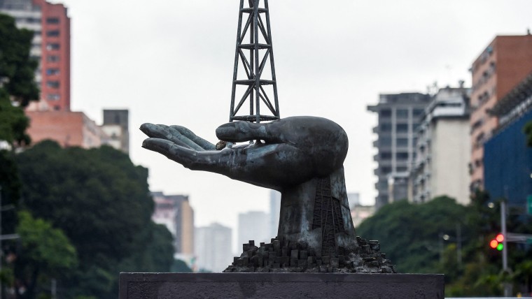 View of the Peace Monument sculpture in front of the Petroleos de Venezuela.