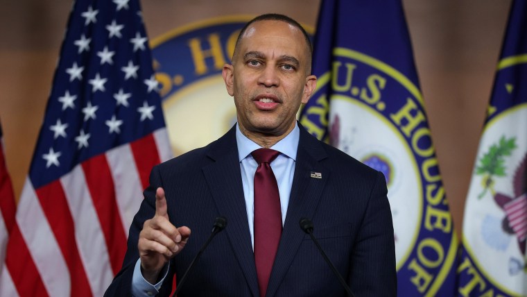 Hakeem Jeffries speaking at a news conference.