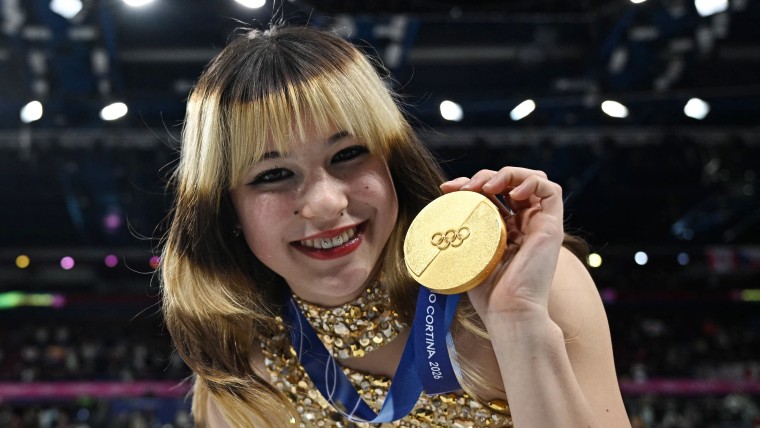 Alysa Liu poses with her gold medal in Milan on Feb. 19, 2026.