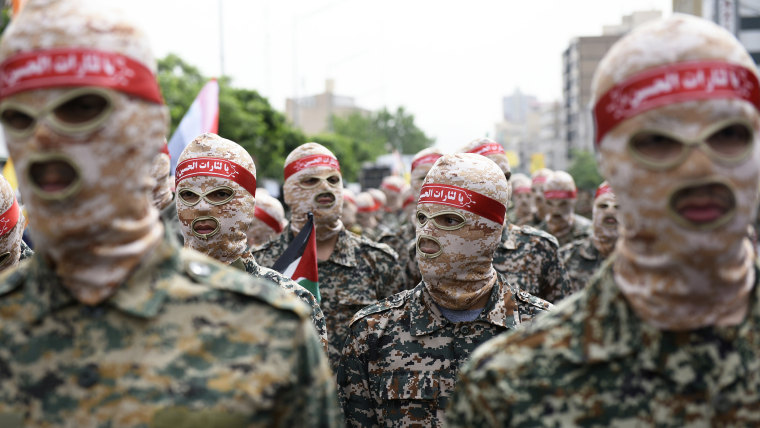 Islamic Revolutionary Guard Corps (IRGC) members march