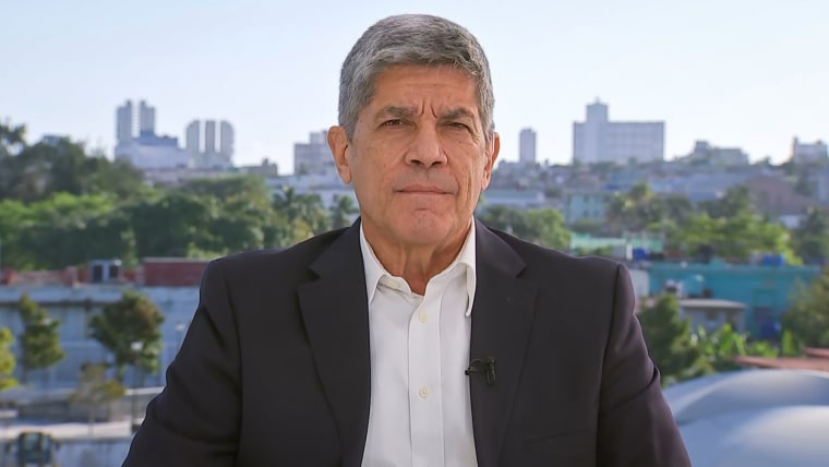 Carlos Fernández de Cossío sits outside