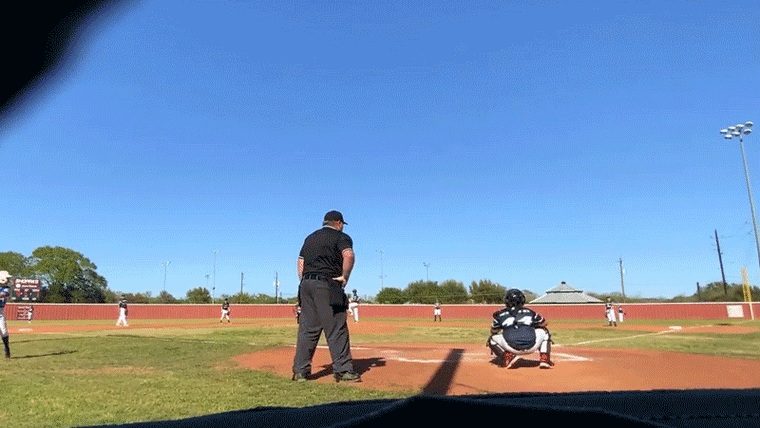 A meteor flies through the sky during a baseball game