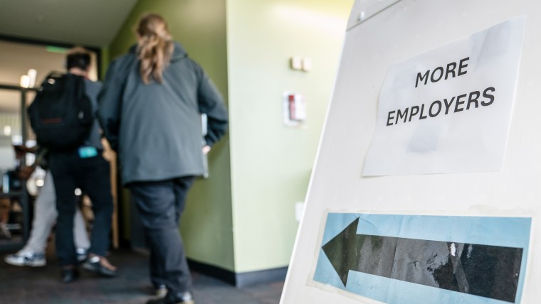 "More Employers" signage during a career fair.