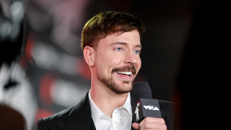 Jimmy Donaldson speaks into a microphone