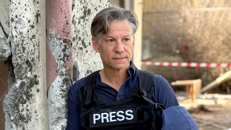 Correspondent Richard Engel in a press flack jacket and helmet.