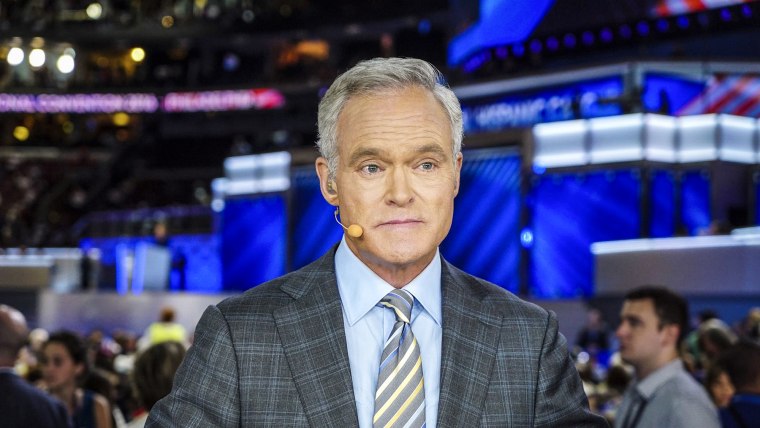 Scott Pelley seated on set