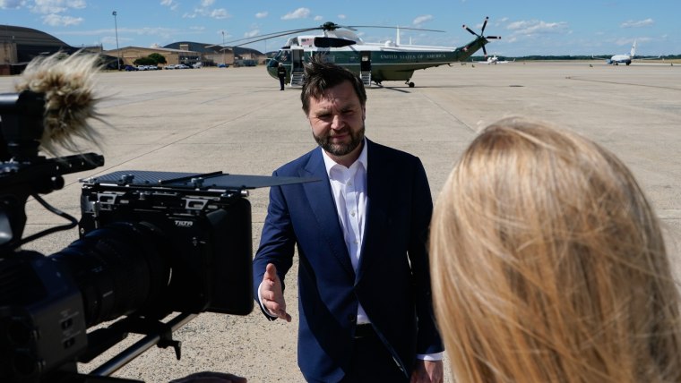 Image: Vice President JD Vance speaks to reporters as he arrives on June 20, 2026, at Joint Base Andrews, Md. ahead of his trip to Switzerland.