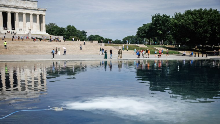 A pump and filtration system at work in the Lincoln Memorial Reflecting Pool in an attempt to remove an algae bloom on June 22, 2026 in Washington.
