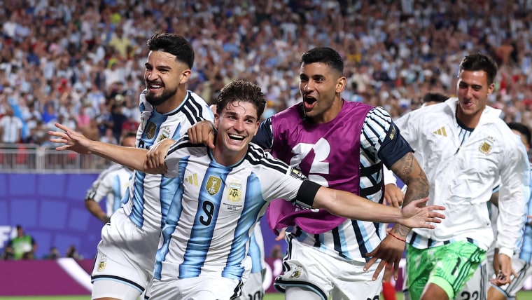Julian Alvarez, No. 9 of Argentina, celebrates with teammates after scoring his team's second goal during the FIFA World Cup 2026 Quarter Final match between Argentina and Switzerland at Kansas City Stadium on July 11, 2026 in Kansas City, Missouri.