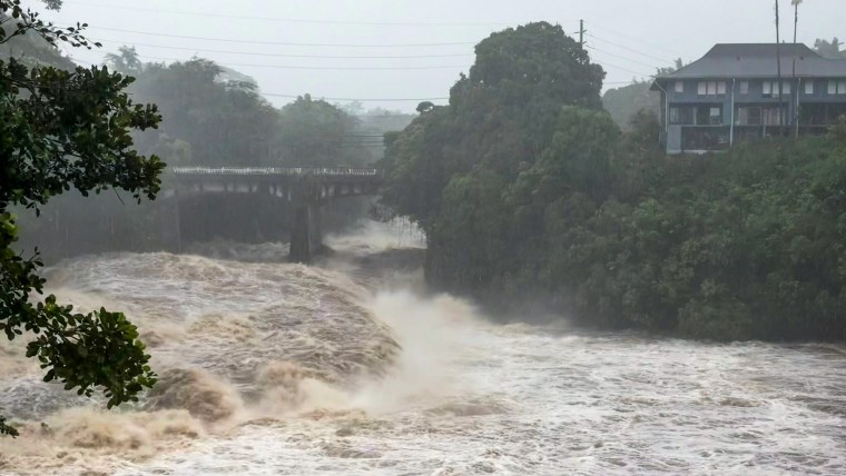 The rising water levels at the Wainaku Street Bridge