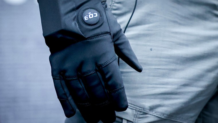 Justin Morris a distributor for Compliant Technologies wears the shock glove.