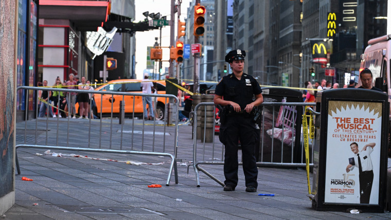 NYPD shoots knife-wielding woman accused of stabbing two people in Times Square