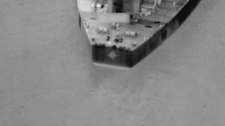 Image: A moving gif of video footage, showing a strike and following destruction