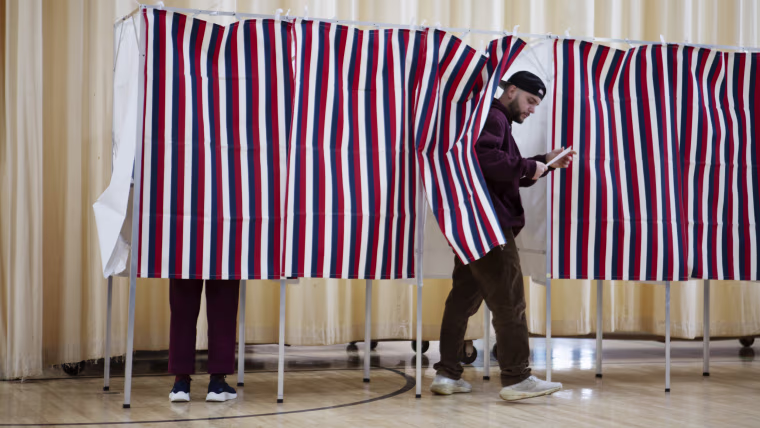 Voters cast their ballots in the New Hampshire primary on Jan. 22, 2024 in Laconia. 