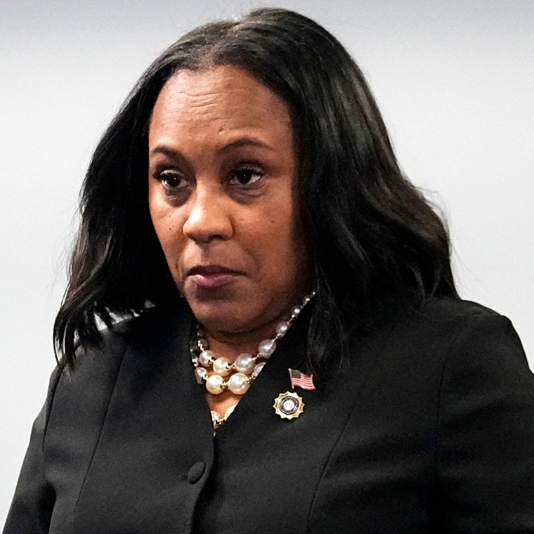Fulton County District Attorney Fani Willis enteres a room in the Fulton County Government Center ahead of a news conference, Monday, Aug. 14, 2023, in Atlanta. Donald Trump and several allies have been indicted in Georgia over efforts to overturn his 2020 election loss in the state.