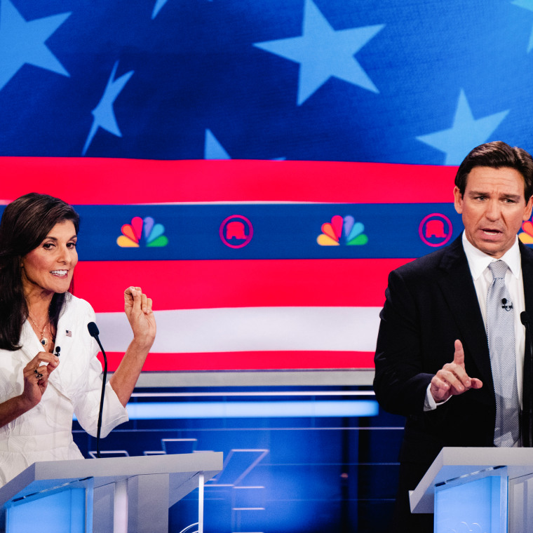 Nikki Haley and Florida Gov. Ron DeSantis speak during the third Republican presidential primary debate in Miami, Fla. on Nov. 8, 2023.