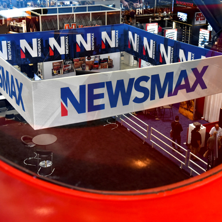 Image: A Newsmax booth at the NRA convention in Houston on May 29.