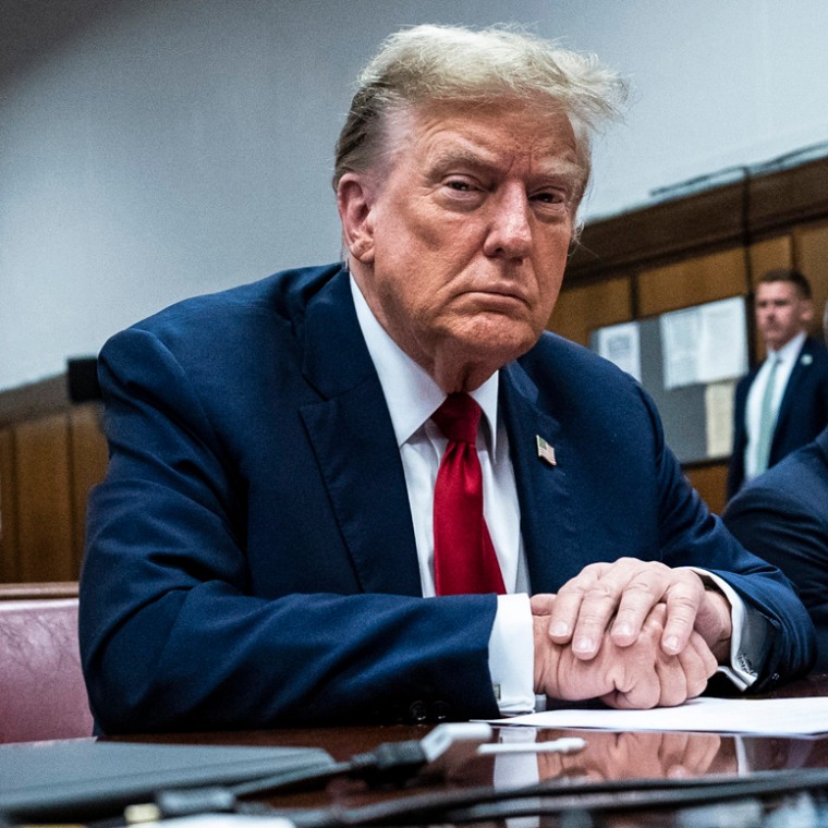 Former President Donald Trump appears with his legal team, Todd Blanche and Emil Bove, right, ahead of the start of jury selection at Manhattan Criminal Court on April 15, 2024 in New York City.