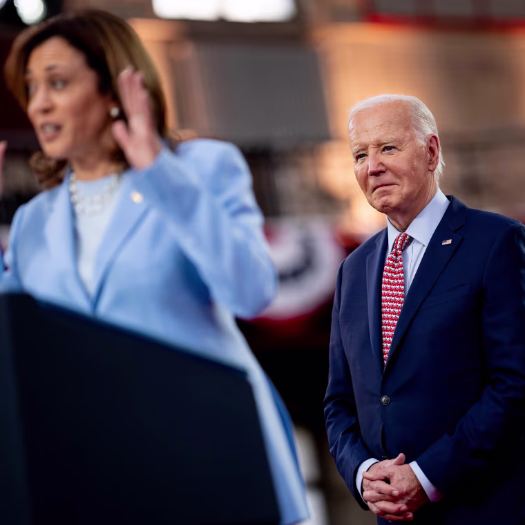 Kamala Harris standing at a lectern introduces Joe Biden during a campaign rally in Philadelphia, Pennsylvania.