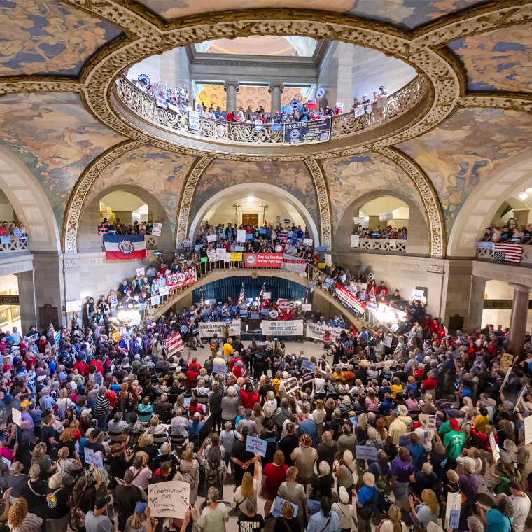 People gather at the Missouri statehouse in Jefferson City to protest redistricting