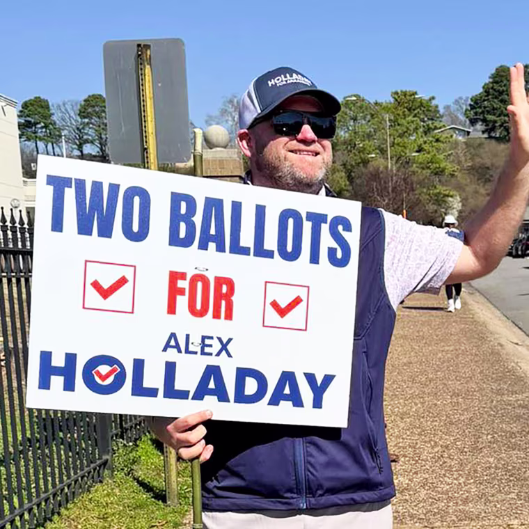 Alex Holladay campaigning.