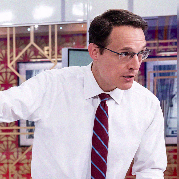 Steve Kornacki, points to his big board, with text that reads "NBC News' Steve Kornacki answers your questions"