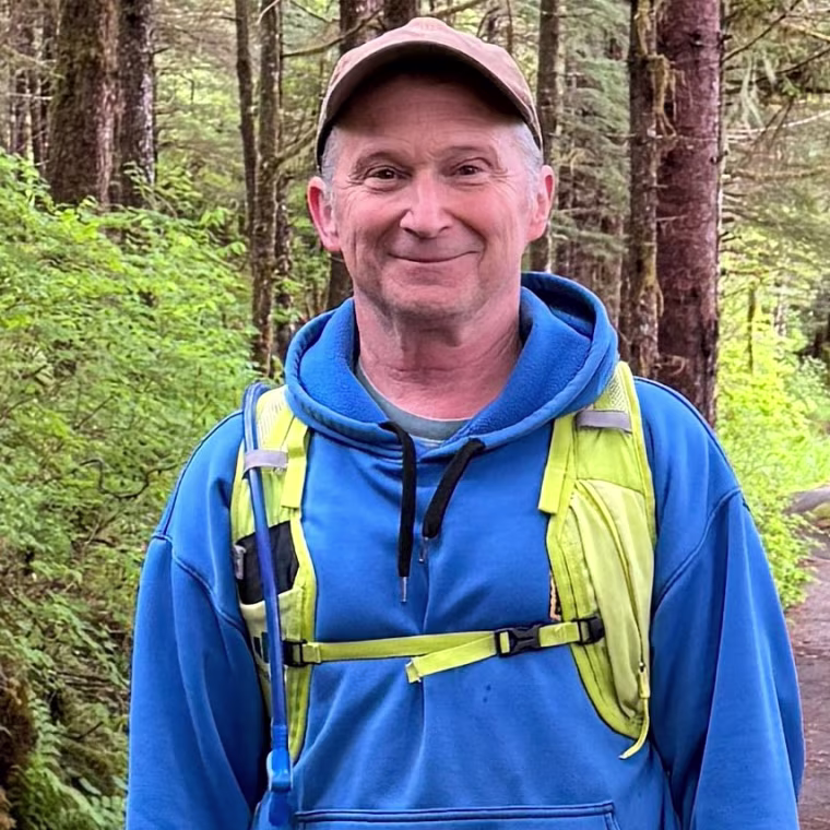 Alaska Senate candidate Dan Sullivan, one of the challengers to the incumbent senator, also named Dan Sullivan, during a hike, Sunday, June 7, 2026, on Kupreanof Island, near Petersburg, Alaska. 