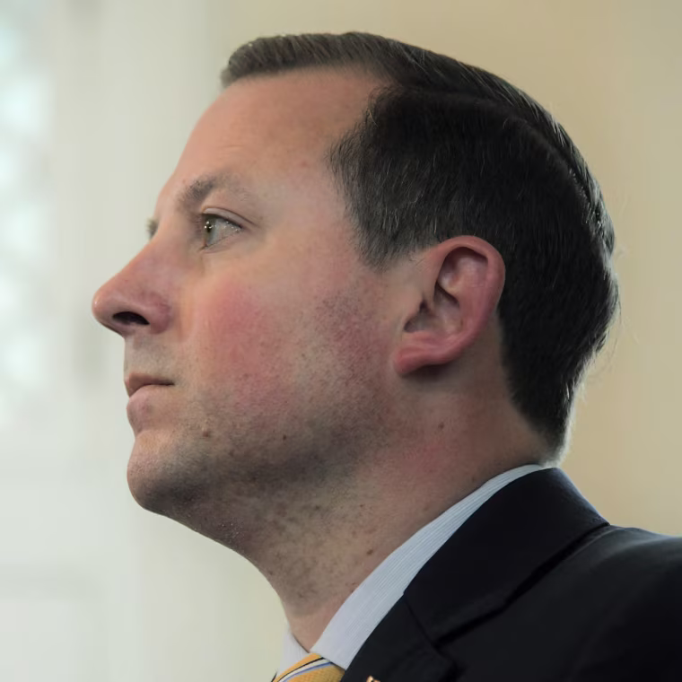Bill Ferguson appears in profile.