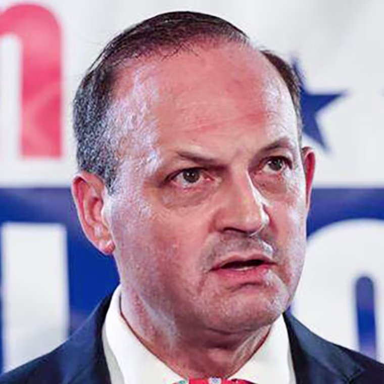Alan Wilson speaks at a podium