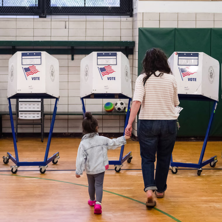 A voter arrives to cast their ballot at a polling location.