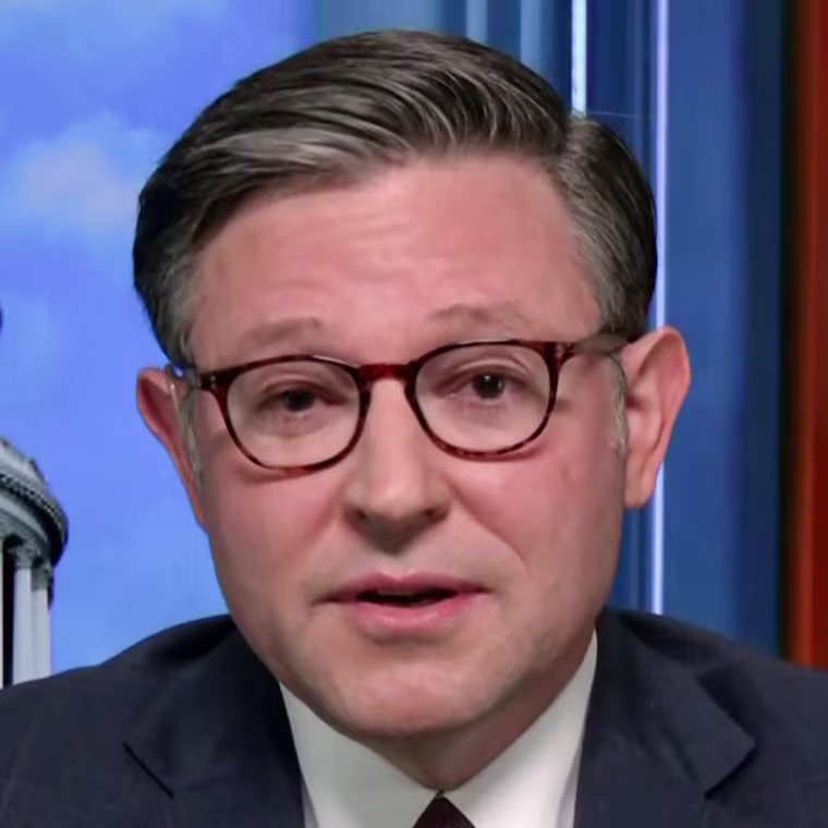 Mike Johnson speaks while seated on the set of Meet the Press