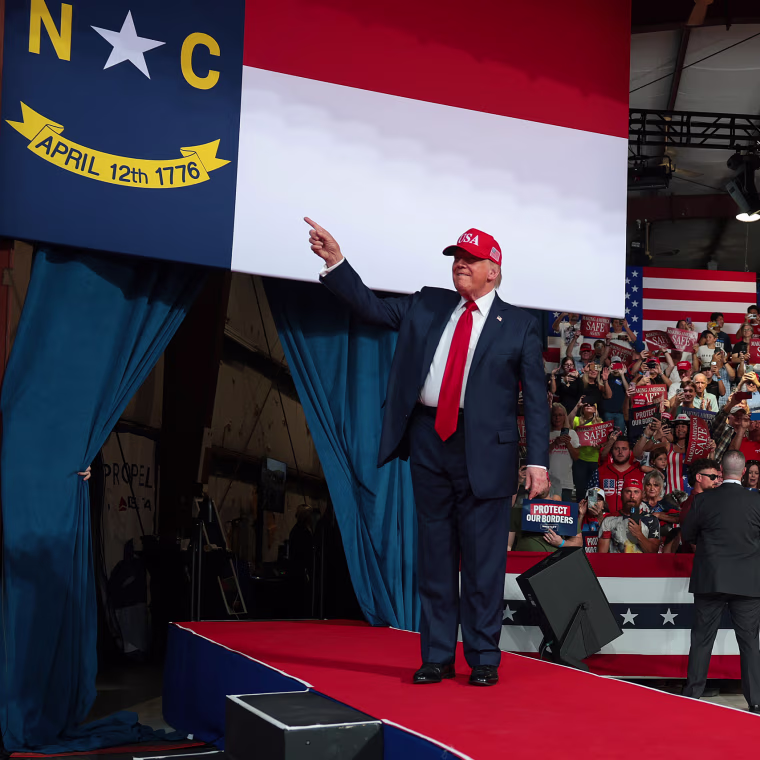 U.S. President Donald Trump greets supporters.