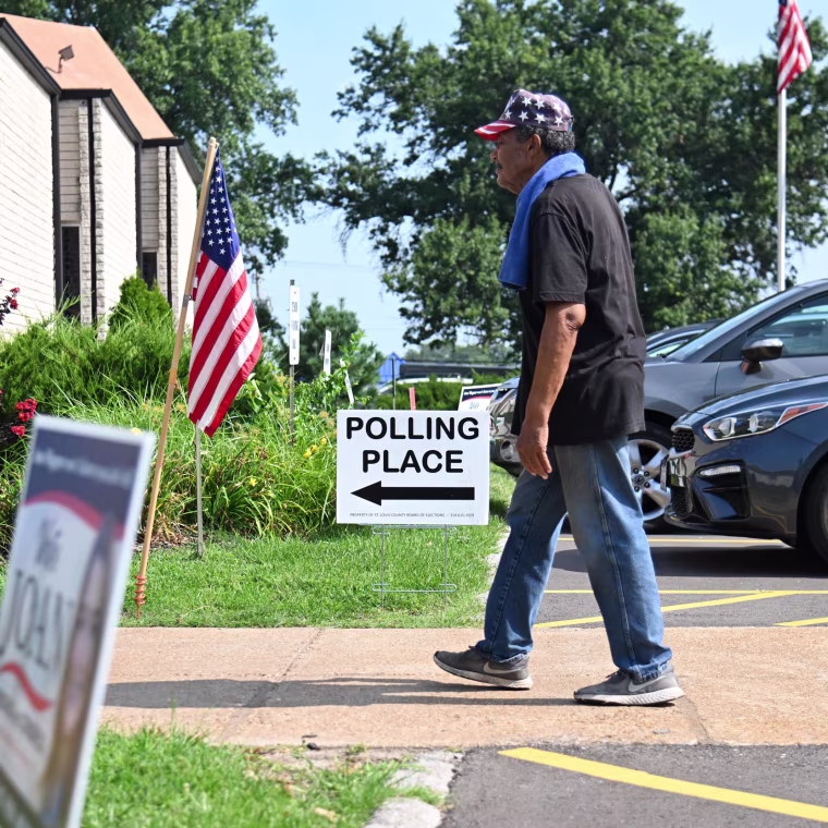 A voter arrives at a polling place on primary election day on Aug. 4, 2026, in St. Louis.