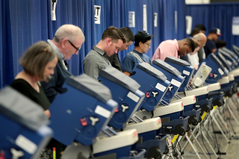 Residents cast ballots for the November 8 election at an early voting site on Oct. 18, 2016 in Chicago.