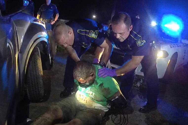 An image from body cam video shows troopers holding up Ronald Greene before paramedics arrived on May 10, 2019, outside of Monroe, La.