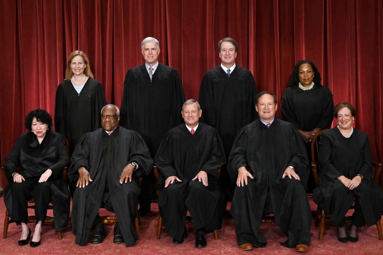 Top left, Amy Coney Barrett, Neil Gorsuch, Brett Kavanaugh and Ketanji Brown Jackson. Bottom left,  Sonia Sotomayor, Clarence Thomas, John Roberts, Samuel Alito and Elena Kagan in Washington