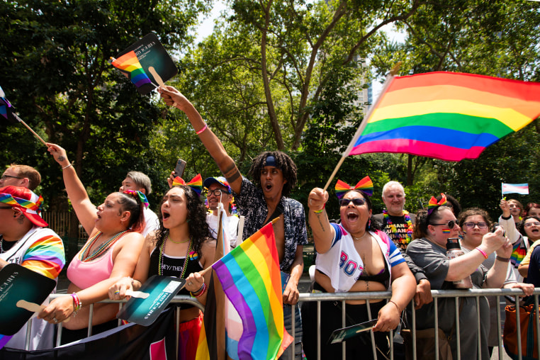 People watch the Pride parade in New York on June 25, 2023.