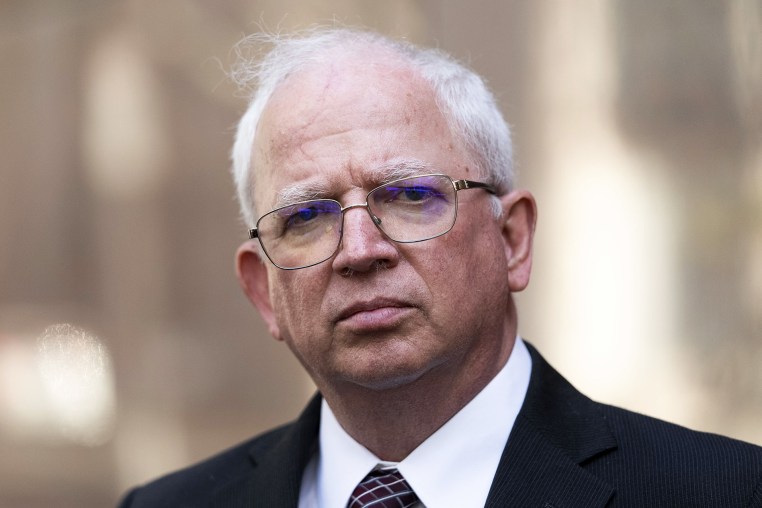 Attorney John Eastman, the architect of a legal strategy aimed at keeping former President Donald Trump in power, listens to questions from reporters after a hearing in Los Angeles, Tuesday, June 20, 2023. Eastman faces 11 disciplinary charges in the State Bar Court of California stemming from his development of a dubious legal strategy aimed at having Vice President Mike Pence interfere with the certification of President Joe Biden's victory. (AP Photo/Jae C. Hong)
