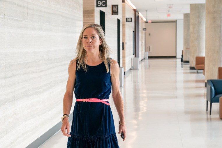 Amanda Zurawski walks towards the courtroom at the Travis County Courthouse on July 19, 2023 in Austin, Texas.